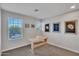 Bedroom with natural light and a modern desk with a woven box accent at 242 N Crosscreek Dr, Chandler, AZ 85225