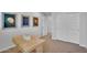 Bedroom featuring artwork, a modern desk and a sliding door closet at 242 N Crosscreek Dr, Chandler, AZ 85225