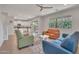 Living room featuring neutral walls, wood flooring, and view to the kitchen at 242 N Crosscreek Dr, Chandler, AZ 85225