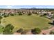 Expansive community park with lush green space and mature trees for outdoor recreation and neighborhood enjoyment at 242 N Crosscreek Dr, Chandler, AZ 85225