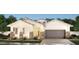 Charming single-story home with stone accents, a neutral palette, and a spacious two-car garage at 2559 E Virginia Cir, Mesa, AZ 85213