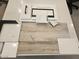 Display of interior design materials with modern hardware and warm tones at 2559 E Virginia Cir, Mesa, AZ 85213