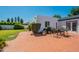 Backyard with paver patio, outdoor seating and lush green lawn at 317 E Orange Dr, Phoenix, AZ 85012