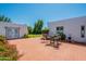 Backyard with paver patio, outdoor seating, and grass at 317 E Orange Dr, Phoenix, AZ 85012