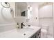 Clean and modern bathroom with vanity, contemporary fixtures and storage at 317 E Orange Dr, Phoenix, AZ 85012