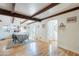 Well-lit dining room boasts hardwood floors and architectural details throughout at 317 E Orange Dr, Phoenix, AZ 85012