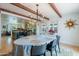 Cozy dining area with stylish chandelier is open to the kitchen, perfect for entertaining at 317 E Orange Dr, Phoenix, AZ 85012