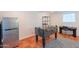 Game room with foosball table, mini refrigerator, and tile flooring at 317 E Orange Dr, Phoenix, AZ 85012