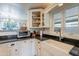 The kitchen sink with view of oven and pantry at 317 E Orange Dr, Phoenix, AZ 85012