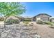 Charming single-story home with low-maintenance desert landscaping and a blue sky at 3201 W Mohawk Ln, Phoenix, AZ 85027
