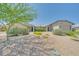 Charming single-story home featuring a low-maintenance desert landscape and a welcoming entrance at 3201 W Mohawk Ln, Phoenix, AZ 85027