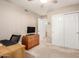 Bright bedroom with a neutral color scheme, dresser, and a spacious closet for plenty of storage at 3412 E Kristal Way, Phoenix, AZ 85050