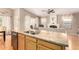 Bright kitchen with a granite island, hardwood floors, stainless steel appliances and an open floor plan at 3412 E Kristal Way, Phoenix, AZ 85050