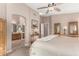 Tranquil main bedroom leading to an ensuite bathroom, offering a serene retreat with ample space and light at 3412 E Kristal Way, Phoenix, AZ 85050