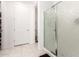 Clean and well-lit bathroom features tile flooring and a glass-enclosed shower at 3415 S 75Th Dr, Phoenix, AZ 85043