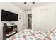 Comfortable bedroom with carpet, closet doors, and a ceiling fan at 3415 S 75Th Dr, Phoenix, AZ 85043