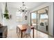 Bright dining area with access to the outdoor patio with BBQ at 40380 W Jenna Ln, Maricopa, AZ 85138