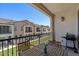 Inviting balcony with outdoor seating and a barbecue grill overlooking the lawn at 4157 E Pinto Dr, Gilbert, AZ 85296