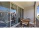 Relaxing balcony with seating area offering views of the neighborhood and clear skies at 4157 E Pinto Dr, Gilbert, AZ 85296