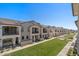 Beautiful townhomes with manicured lawns, inviting balconies and well maintained walkways at 4157 E Pinto Dr, Gilbert, AZ 85296