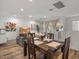 Open-concept living room features a dining area and a comfortable seating area at 4157 E Pinto Dr, Gilbert, AZ 85296