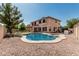 Backyard view of the pool, spa, and house at 4507 E Lantern Pl, Gilbert, AZ 85297