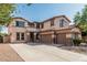 Spacious two-story home with three-car garage and neutral stucco exterior at 4507 E Lantern Pl, Gilbert, AZ 85297