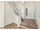 Open foyer with tile floors, staircase, and front door at 4507 E Lantern Pl, Gilbert, AZ 85297