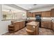 Traditional kitchen with island and oak cabinets at 4507 E Lantern Pl, Gilbert, AZ 85297