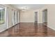 Bright living room featuring beautiful wood floors, neutral colors and multiple windows at 4507 E Lantern Pl, Gilbert, AZ 85297
