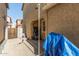 Backyard patio with a protective covering, perfect for enjoying the outdoors at 5 N 87Th Ln, Tolleson, AZ 85353