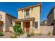 Cozy two-story home with desert landscaping, covered porch and a terracotta tiled roof at 5 N 87Th Ln, Tolleson, AZ 85353