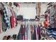Organized walk-in closet with clothing racks and shelving offering ample storage space at 5 N 87Th Ln, Tolleson, AZ 85353