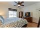 Comfortable bedroom with natural light and ample closet space at 5335 E Shea Blvd # 2081, Scottsdale, AZ 85254