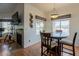 Cozy dining area next to fireplace, with an adjacent office space at 5335 E Shea Blvd # 2081, Scottsdale, AZ 85254