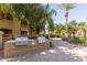 Community outdoor grills with lush landscaping offering a great place for outdoor cooking and entertaining at 5335 E Shea Blvd # 2081, Scottsdale, AZ 85254