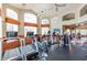 Bright gym with high ceilings and exercise equipment including treadmills and stationary bikes at 5335 E Shea Blvd # 2081, Scottsdale, AZ 85254