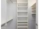 Walk in closet offering ample storage space with shelving at 581 S Roosevelt St, Tempe, AZ 85281