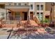 Townhome featuring an inviting front porch with multiple stairs up to the entrance at 581 S Roosevelt St, Tempe, AZ 85281