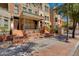 Townhome showcasing an inviting front porch and well-maintained landscaping at 581 S Roosevelt St, Tempe, AZ 85281