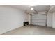Spacious two-car garage with sealed concrete flooring and garage door at 581 S Roosevelt St, Tempe, AZ 85281