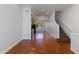 Spacious living room featuring gleaming hardwood floors, large windows, and an open floor plan at 581 S Roosevelt St, Tempe, AZ 85281