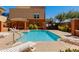 Community pool area with lounge chairs and clear blue water, perfect for relaxation and leisure at 581 S Roosevelt St, Tempe, AZ 85281