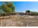Spacious backyard featuring a well-maintained lawn and a sparkling swimming pool, perfect for outdoor enjoyment at 5841 W Kesler St, Chandler, AZ 85226