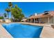 Backyard swimming pool with a covered patio area, perfect for outdoor entertaining at 5841 W Kesler St, Chandler, AZ 85226