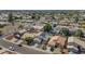 An aerial view of a suburban neighborhood with well-maintained homes, desert landscaping, and some pools at 8599 W Athens St, Peoria, AZ 85382