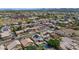Aerial view of a neighborhood with lush landscaping and community park at 8599 W Athens St, Peoria, AZ 85382