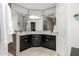 Bright bathroom with double sink vanity, large mirror, and tiled floors to bring comfort to your morning routine at 9389 N 87Th Way, Scottsdale, AZ 85258