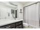 Bathroom featuring a vanity with drawers, shower and tub at 9389 N 87Th Way, Scottsdale, AZ 85258