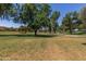 Lush greenspace features mature trees and walking paths, offering a tranquil outdoor setting at 9389 N 87Th Way, Scottsdale, AZ 85258